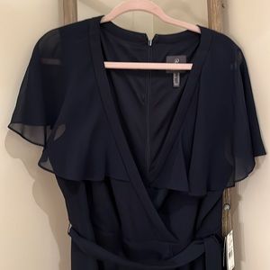 Brand new Adriana, Papel navy dress is belted at the waist v neck wrap look.
